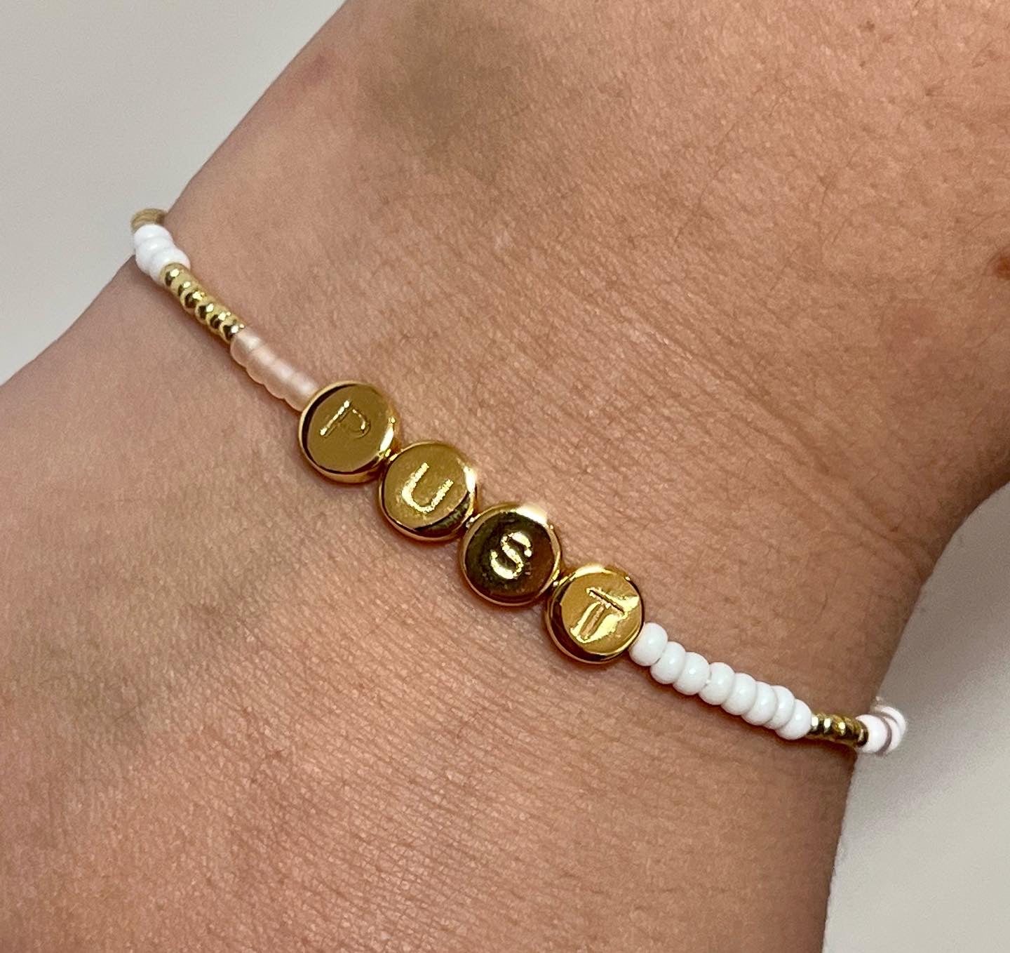 PUST armbånd i gull