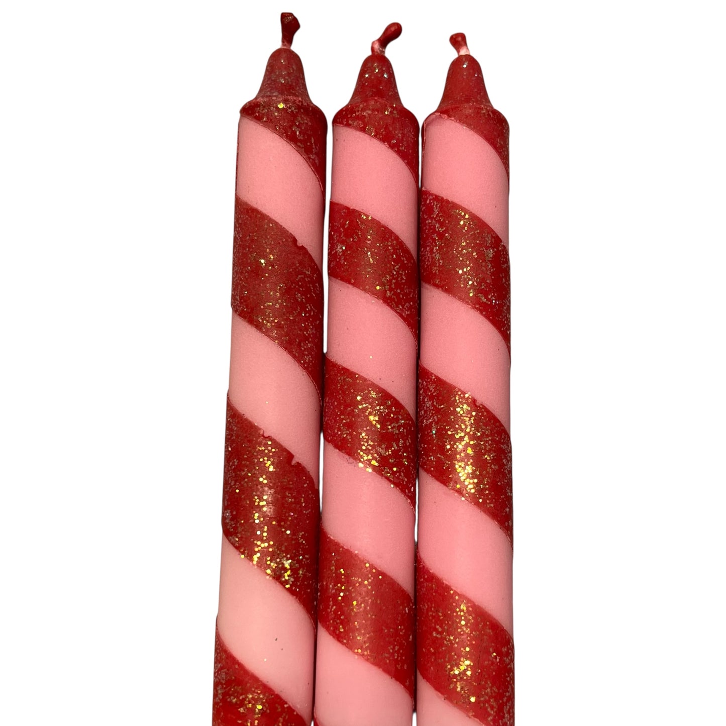 Kronelys i fargene rød og rosa, med glitter