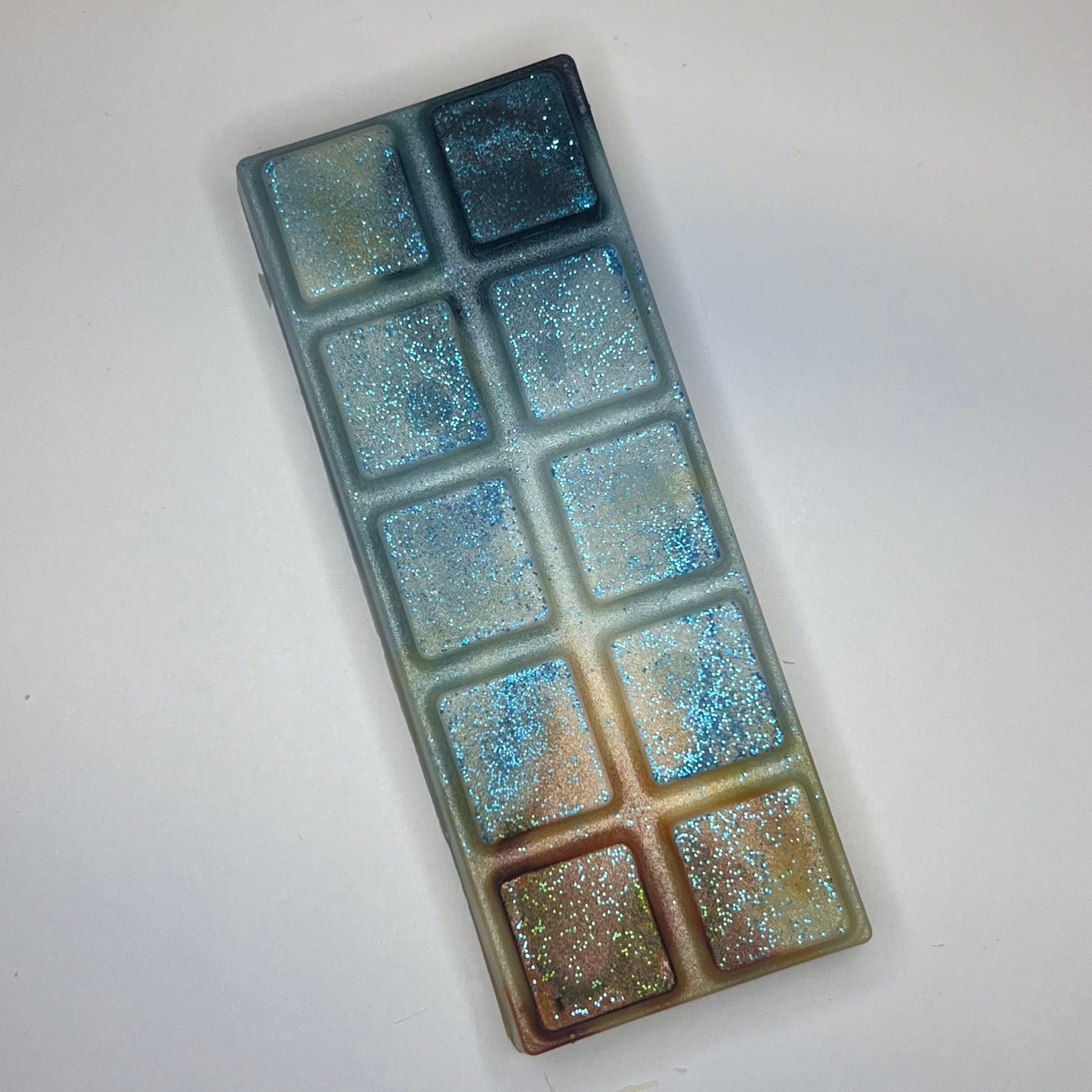 Teal og oransje duftvoks/smelteoks med turkist glitter