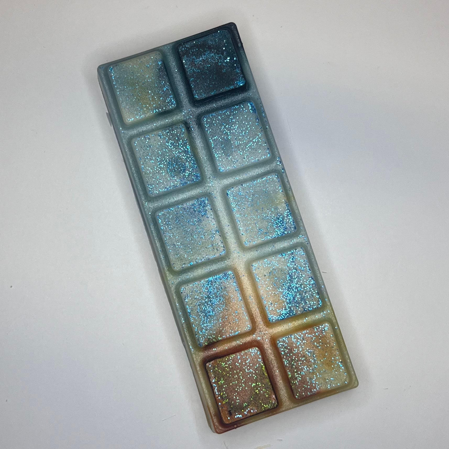 Teal og oransje duftvoks/smelteoks med turkist glitter