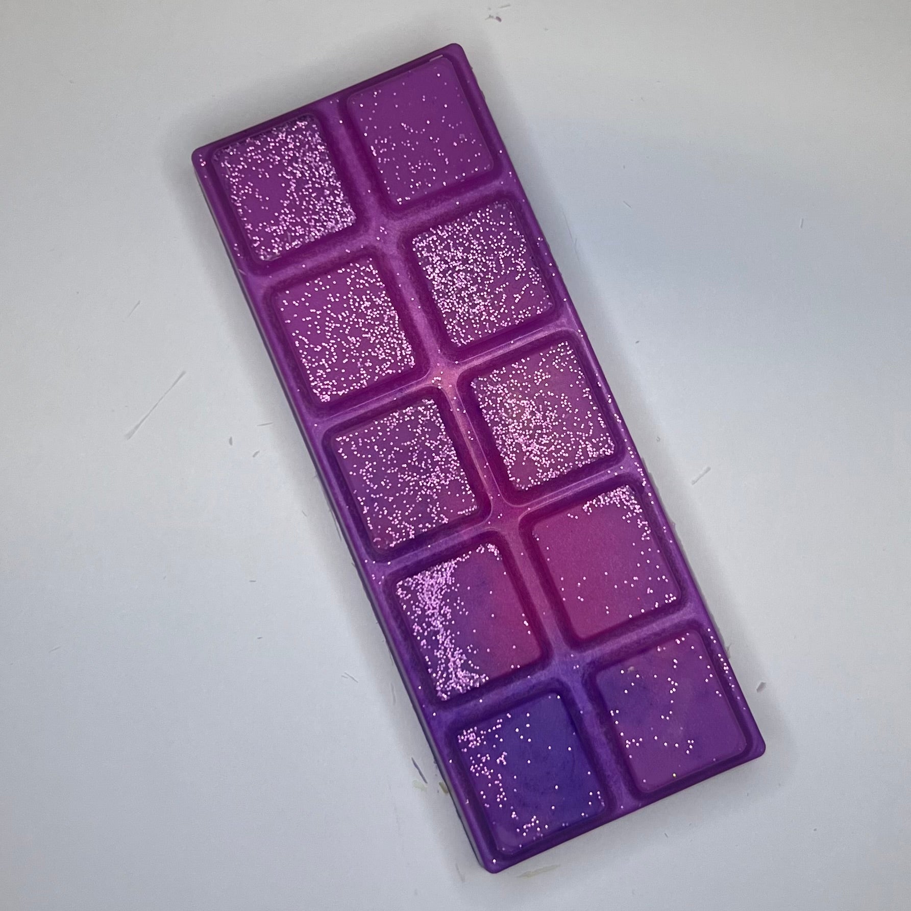 Rosa og lilla duftvoks/smeltevoks med rosa og lilla glitter